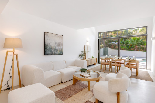 Living and dining area with large window front