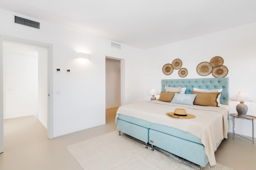 Master bedroom with walk-in dressing room