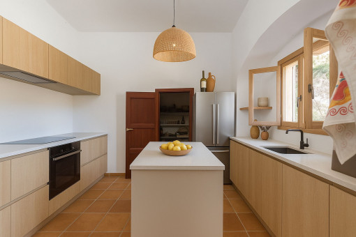 Visualization – Contemporary Mediterranean-style kitchen showing how the space could look after a light renovation