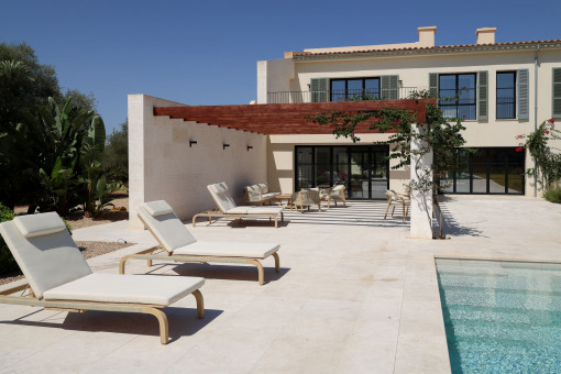Beautiful pool area with sun loungers