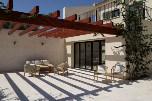 Covered lounge area beneath a stylish pergola