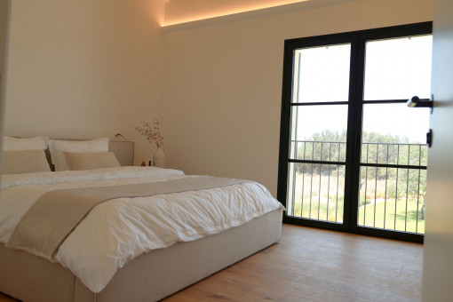 Bright bedroom overlooking the garden