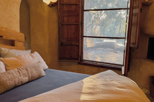 One of the four bedrooms in the house