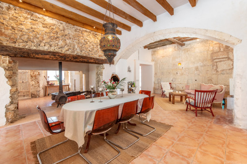 Open dining and living area with fireplace