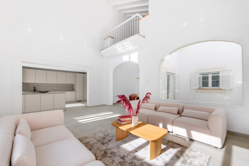 Living area with high ceilings and gallery