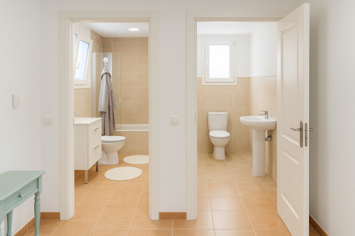 En-suite bathroom on the left & separate guest WC on the right – smart layoutBathroom Interiors_remix_01jtp1nr5sffct80cf9x7ngfzh