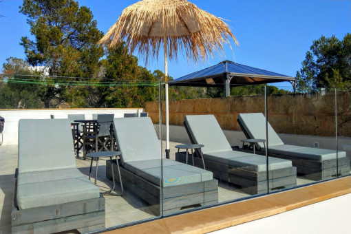 Roof terrace with sun loungers
