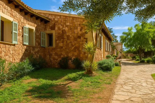 Natural-stone façade of the main house