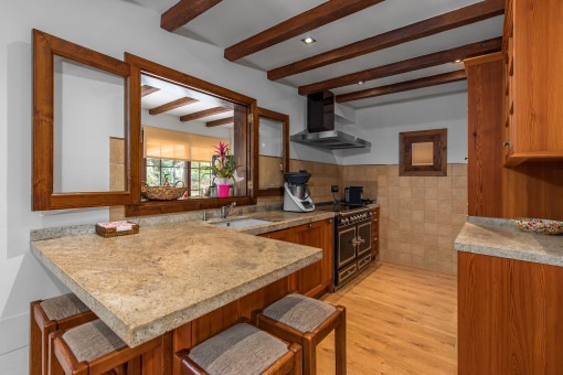 Separate kitchen with stone details