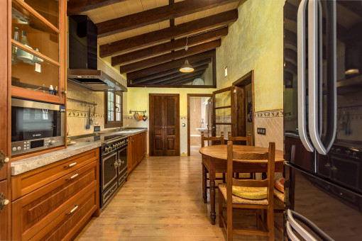 Open-plan kitchen with dining area