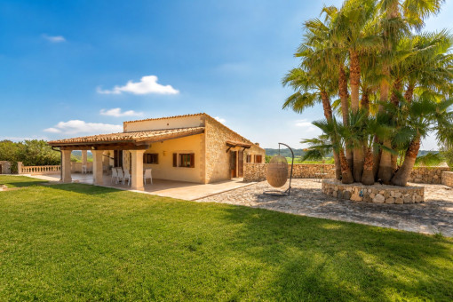 Mediterranean finca with garden terrace and palm trees in Sineu