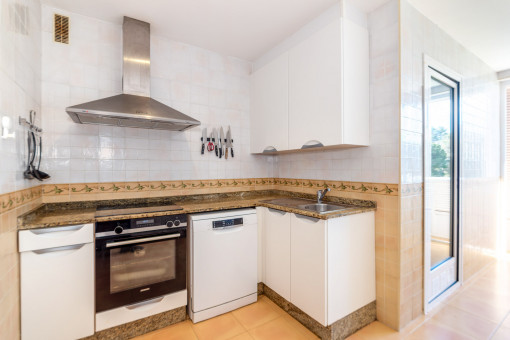 Bright separate kitchen