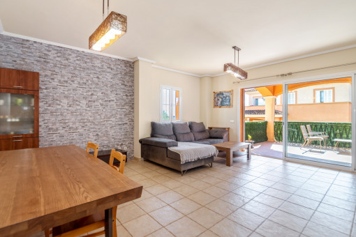 Living/dining room with access to the terrace