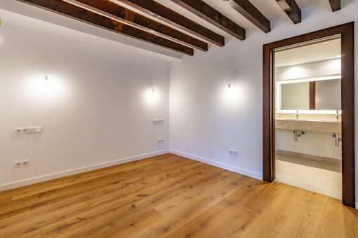 Master bedroom with an en suite bathroom