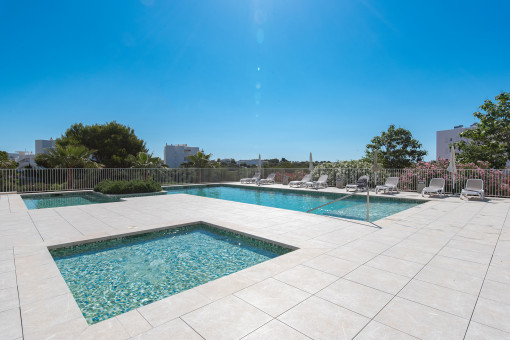 Community pool with sun terrace