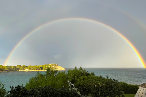 Rainbow from lower side of the land