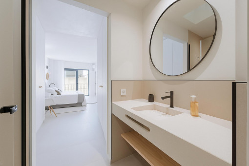 Bathroom with view into bedroom