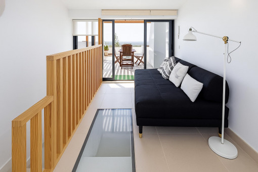 Lounge area with roof terrace access