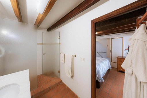 Bathroom with walk-in shower and wood details