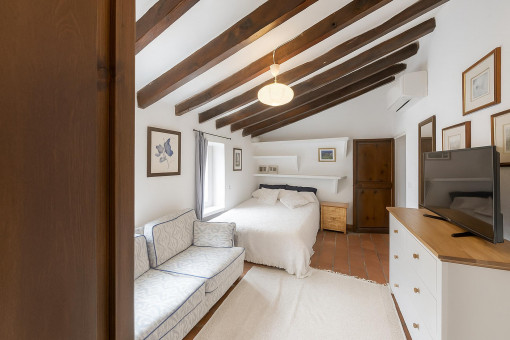 Second bedroom with beamed ceiling