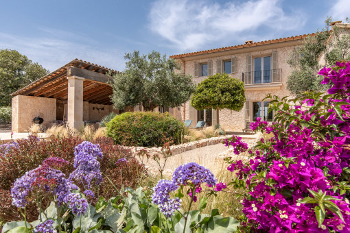 Mediterranean Garden & traditional natural stone facade