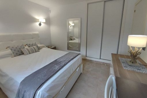 Bright bedroom with generous storage