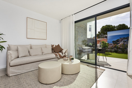 Bright living area with access to the terrace