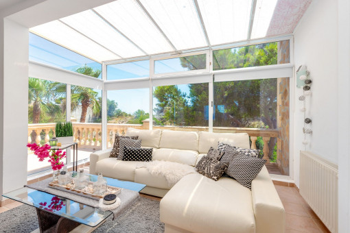 Bright living room with panoramic views and direct terrace access