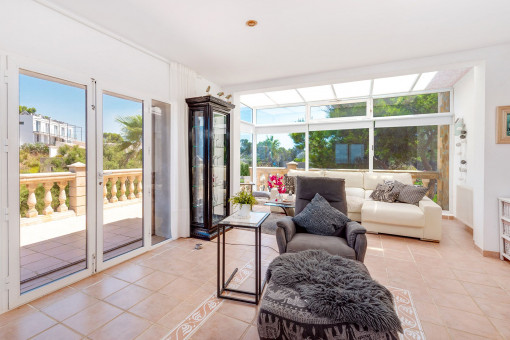 Bright living room with panoramic views and direct terrace access
