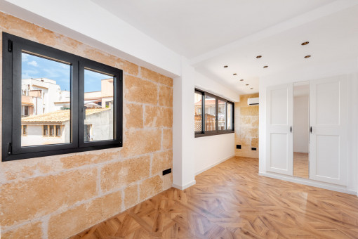 Built-in wardrobes and a work corner in one of the bedrooms