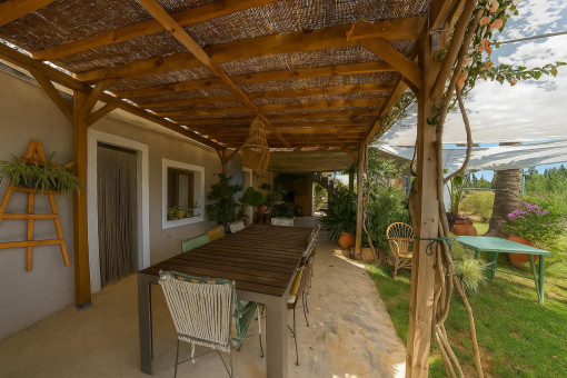 Covered veranda with outdoor dining area