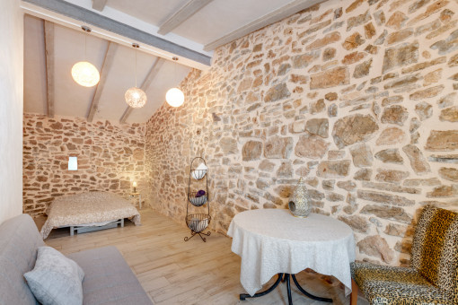 Spacious natural-stone bedroom