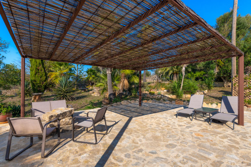 Pergola terrace in the finca’s Mediterranean garden