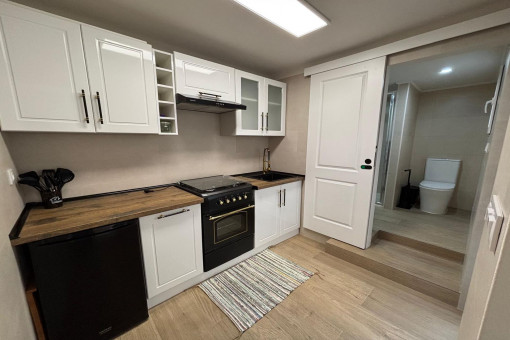 Practical main kitchen on the upper level