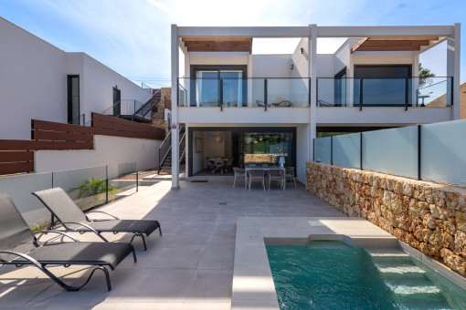Exterior view of the house with pool and sun terrace