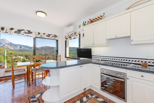 Open kitchen with adjoining dining area