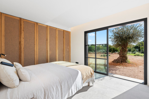 One of the three lower-level bedrooms with garden access