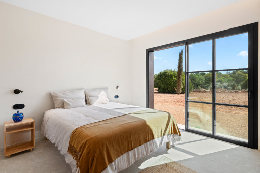 One of the three lower-level bedrooms with garden access