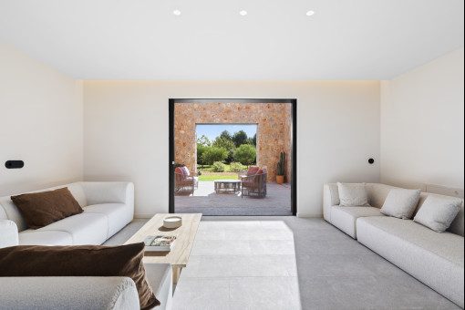 Open living concept with views of lush Mediterranean landscaping