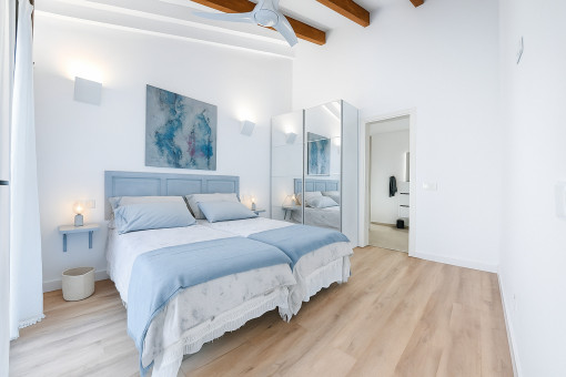 Master bedroom with double bed and terrace access