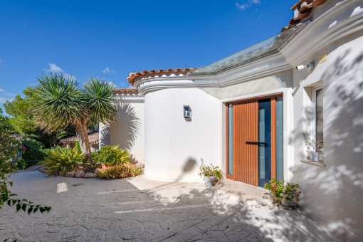 Inviting entrance with Mediterranean architecture