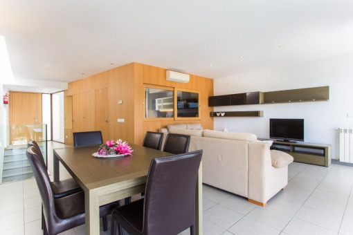 Open living and dining area and separated kitchen