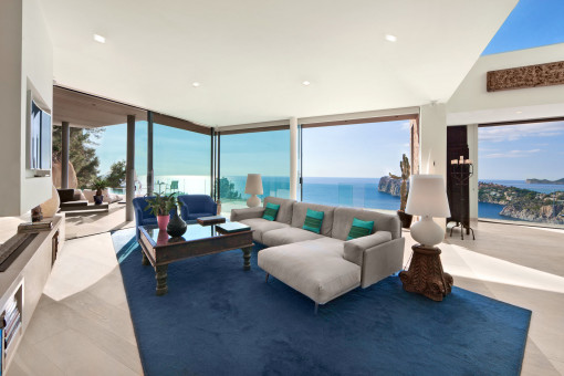 Spacious living area with panoramic sea views and access to the terrace