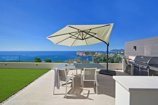 Outdoor kitchen with wide sea views – cooking and enjoying under the open sky