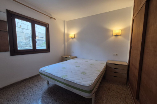 One of three bedrooms