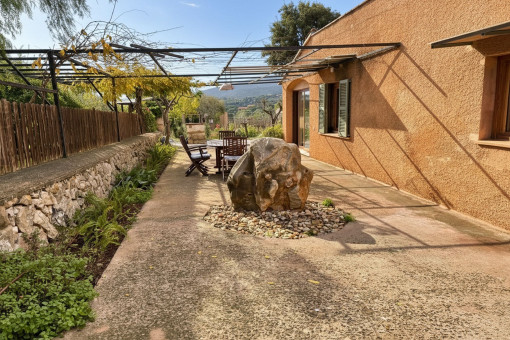 The house is surrounded by terraces