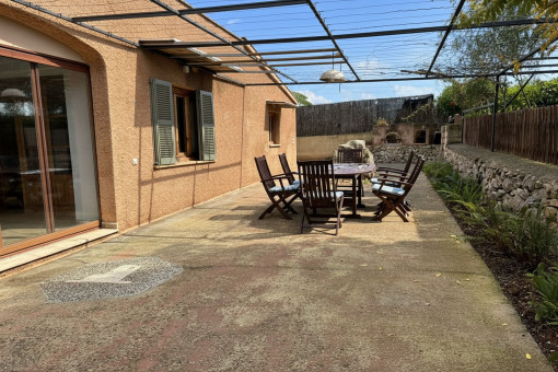 The house is surrounded by terraces