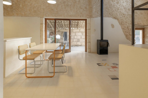 Dining and living area with stove