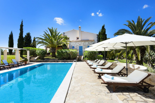 Inviting pool area with sun loungers
