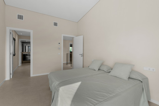 Master bedroom with walk-in wardrobe and en-suite bathroom